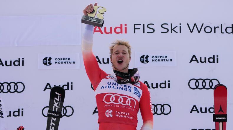Switzerland's Marco Odermatt celebrates after winning a World Cup men's super-G skiing race, Thursday, Nov. 27, 2025, in Copper Mountain. (AP Photo/John Locher)