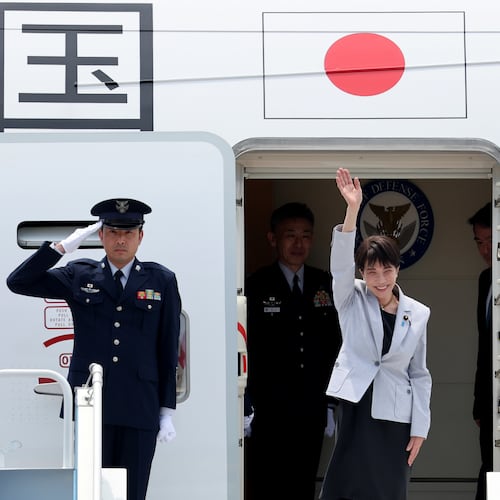 Japan's Prime Minister Sanae Takaichi waves upon arrival at the Daegu International Airport in Daegu, South Korea, Tuesday, May 19, 2026. (Yoon Kwan-shick/Yonhap via AP)