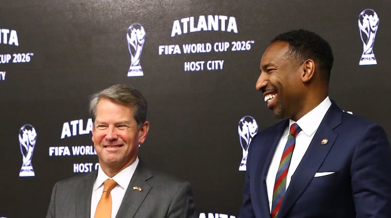 Gov. Brian Kemp (left) and Atlanta Mayor Andre Dickens shared a laugh during a news conference nearly three years ago about the 2026 World Cup. (Curtis Compton/AJC)
