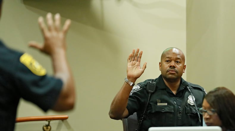October 2, 2019 - Decatur -  DeKalb police officer Lyn Anderson, who arrived at the scene shortly after the shooting, is sworn in.   The murder trial of former DeKalb County Police Officer Robert "Chip" Olsen continued today.  Olsen is charged with murdering war veteran Anthony Hill.  Bob Andres / robert.andres@ajc.com