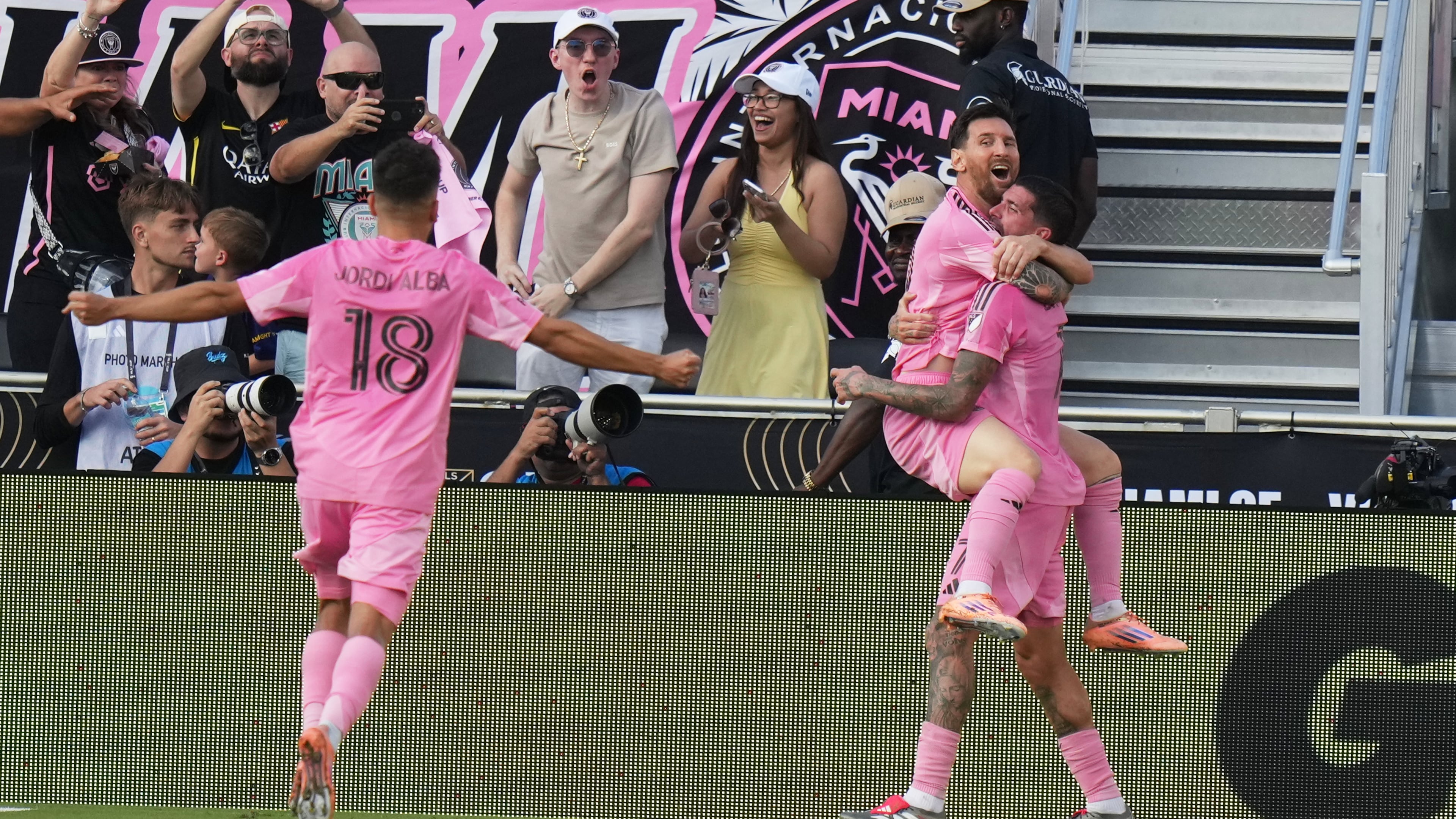 Inter Miami midfielder Rodrigo de Paul (7) celebrates a goal with forward Lionel Messi (10) and defender Jordi Alba (18) during the second half of the MLS Cup final soccer match against the Vancouver Whitecaps Saturday, Dec. 6, 2025, in Fort Lauderdale, Fla. (AP Photo/Lynne Sladky)