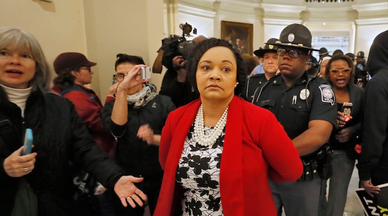 State Sen. Nikema Williams, the chairwoman of the state Democratic Party, was arrested along with 14 other protesters at the state Capitol in November. The cases against all 15 people have been dismissed. BOB ANDRES / BANDRES@AJC.COM