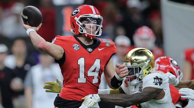 Georgia quarterback Gunner Stockton (14) throws a pass during the fourth quarter against Notre Dame during the 91st Allstate Sugar Bowl at Caesars Superdome on Thursday, Jan. 2, 2025, in New Orleans. (Jonathan Bachman/Getty Images/TNS)