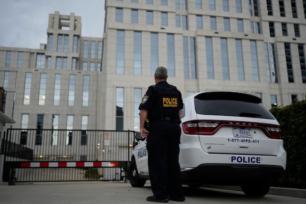 A homeland security police officer stands outside the federal courthouse on Friday, June 6, 2025, in Nashville, Tenn. (AP Photo/George Walker IV)