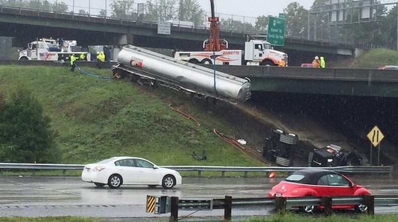 Crews were working Saturday afternoon to remove the oil tanker involved in Friday’s crash at I-285 and Ga. 400. (Credit: Channel 2 Action News)