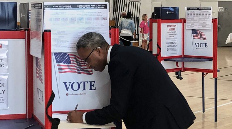 District of Columbia mayoral candidate Kenyan McDuffie fills out his ranked choice ballot during the D.C. primary election, Tuesday, June 16, 2026 in Washington. (AP Photo/Gary Fields)