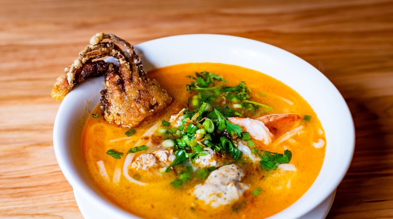 Banh canh cua, seafood soup with house-made tapioca noodles, at Vietvana. CONTRIBUTED BY HENRI HOLLIS