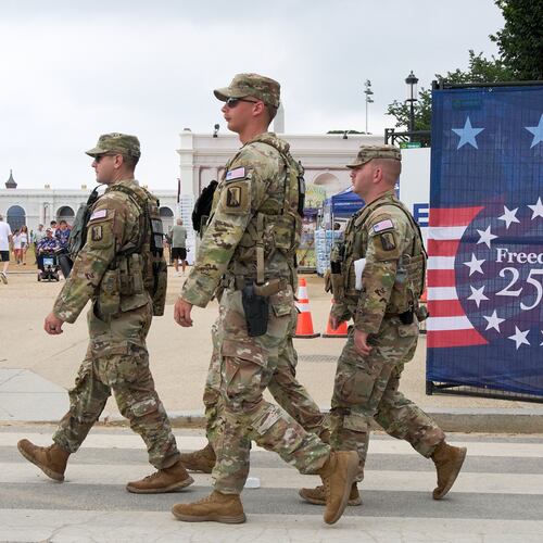 Soldiers from the Mississippi National Guard patrol along the Great American State Fair on the National Mall, Monday, July 6, 2026, in Washington. (AP Photo/Jacquelyn Martin)