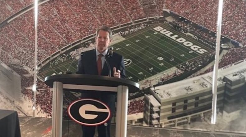 Georgia Gov. Brian Kemp spent Monday in Los Angeles  for the College Football Playoff national championship game as state lawmakers gathered in Atlanta to kick off another legislative session. (Greg Bluestein/AJC file photo)
