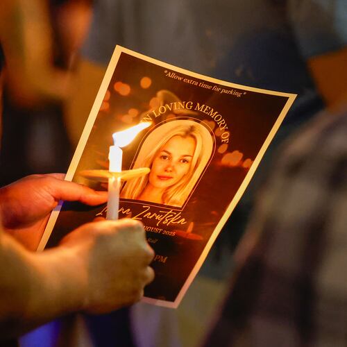 FILE - Community members gather for a vigil honoring the life of Iryna Zarutska, a Ukranian refugee, who was fatally stabbed on a commuter train, Sept. 22, 2025, in Charlotte, N.C. (AP Photo/Nell Redmond, File)