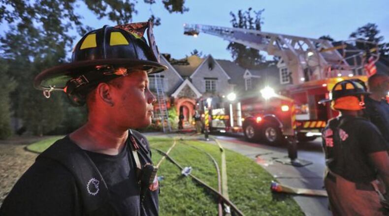 Sandy Springs is considering a $500 fine against alarm companies that fail to register a home alarm system with the city. AJC FILE