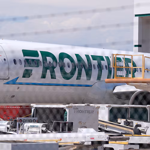 Frontier Airlines jetliner number n646fr sits outside the airlines technical operations center with other jetliners in for service north of Denver International Airport Saturday, May 9, 2026, in Denver. (AP Photo/David Zalubowski)