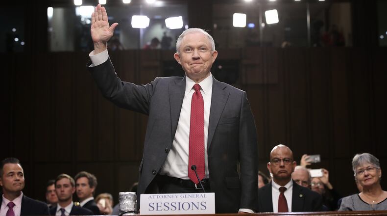 WASHINGTON, DC - JUNE 13: U.S. Attorney General Jeff Sessions is sworn-in prior to testifying before the Senate Intelligence Committee on Capitol Hill June 13, 2017 in Washington, DC. Sessions recused himself from the Russia investigation and he was later discovered to have had contact with the Russian ambassador last year despite testifying to the contrary during his confirmation hearing. (Photo by Win McNamee/Getty Images)