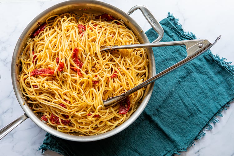 Spicy Sun-Dried Tomato Pasta includes garlic, capers and red pepper flakes. (Aaliyah Man for the AJC/food styling by Kate Williams)