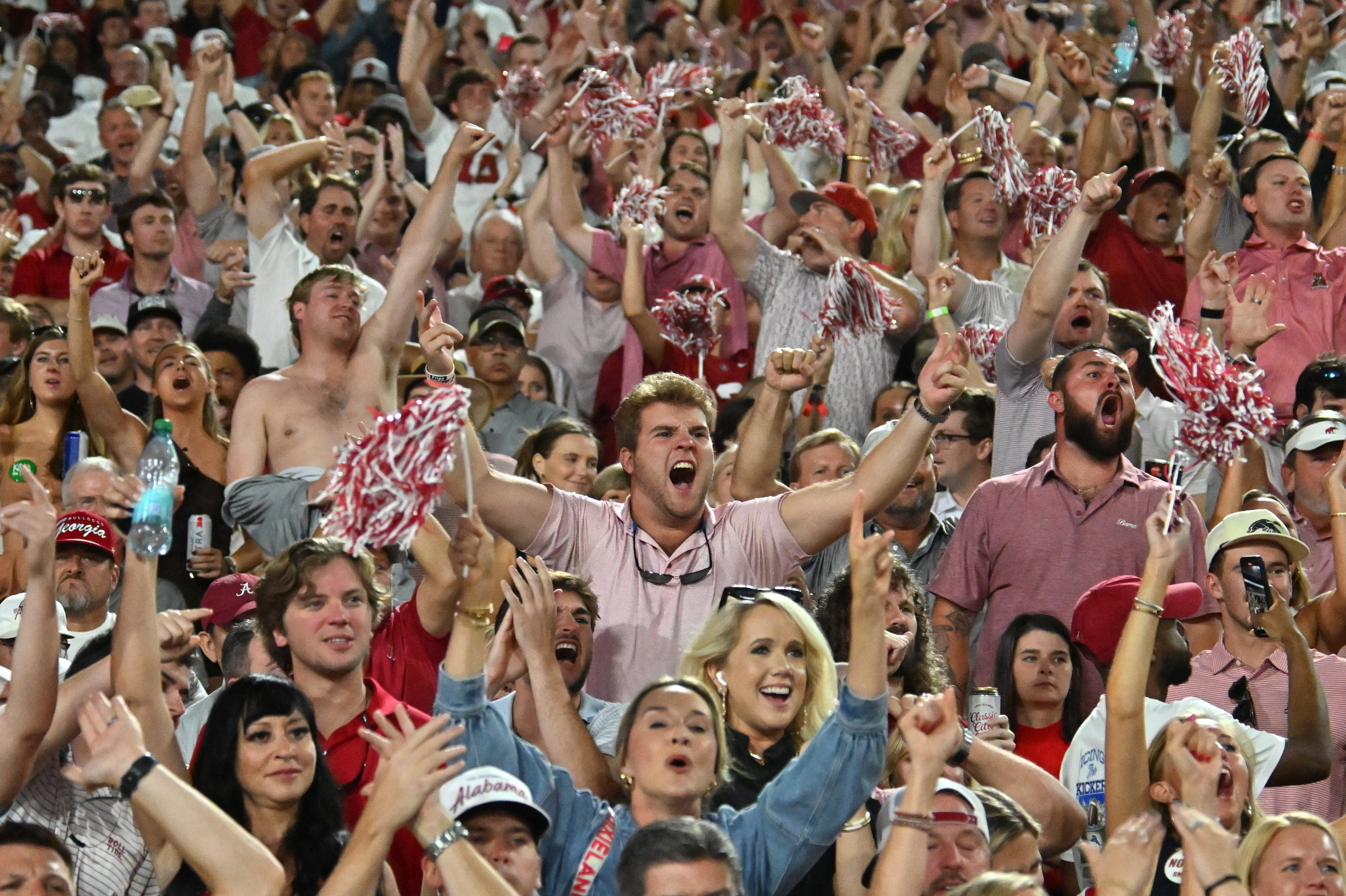 Alabama fans cheer during the second half in an NCAA football game at Sanford Stadium, Saturday, September 27, 2025, in Athens. Alabama won 24-21 over Georgia. (Hyosub Shin / AJC)