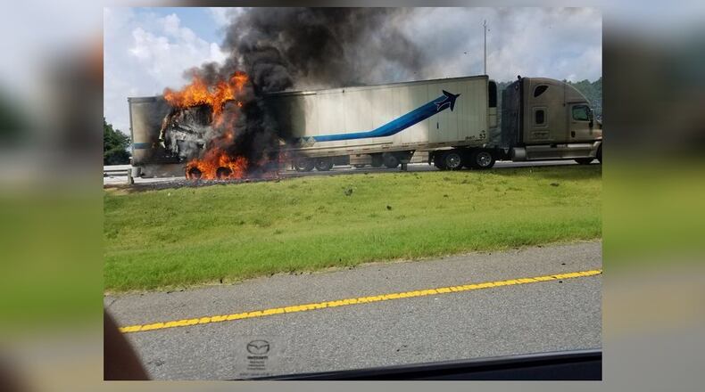 A tractor-trailer fire caused heavy delays on I-75 North in Cobb County on Tuesday. (Credit: Channel 2 Action News)