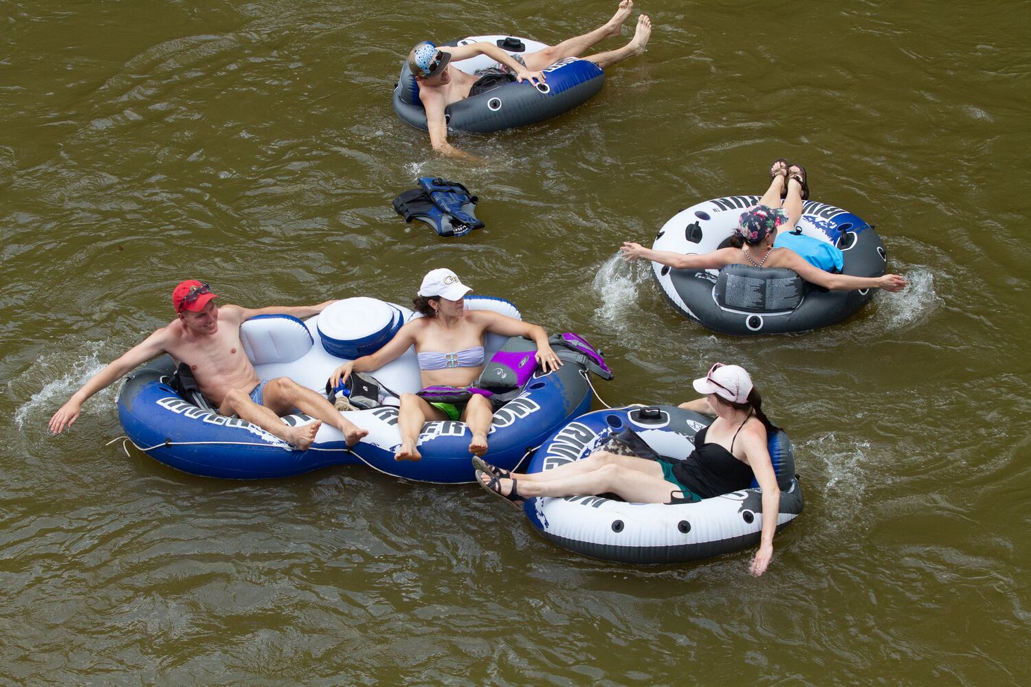 PHOTOS: Summer tradition returns with tubing on the Hooch