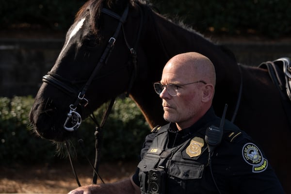 Atlanta police Lt. Greg Lyon said of navigating crowds atop his horse, Drifter: "It gives us a great vantage point to identify problems and respond to them." (Ben Hendren for the AJC)
