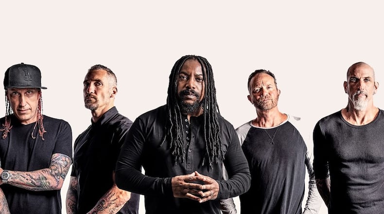 Sevendust will play at the Masquerade on New Year's Eve. The band's Lajon Witherspoon, center, is also at work on a solo album.