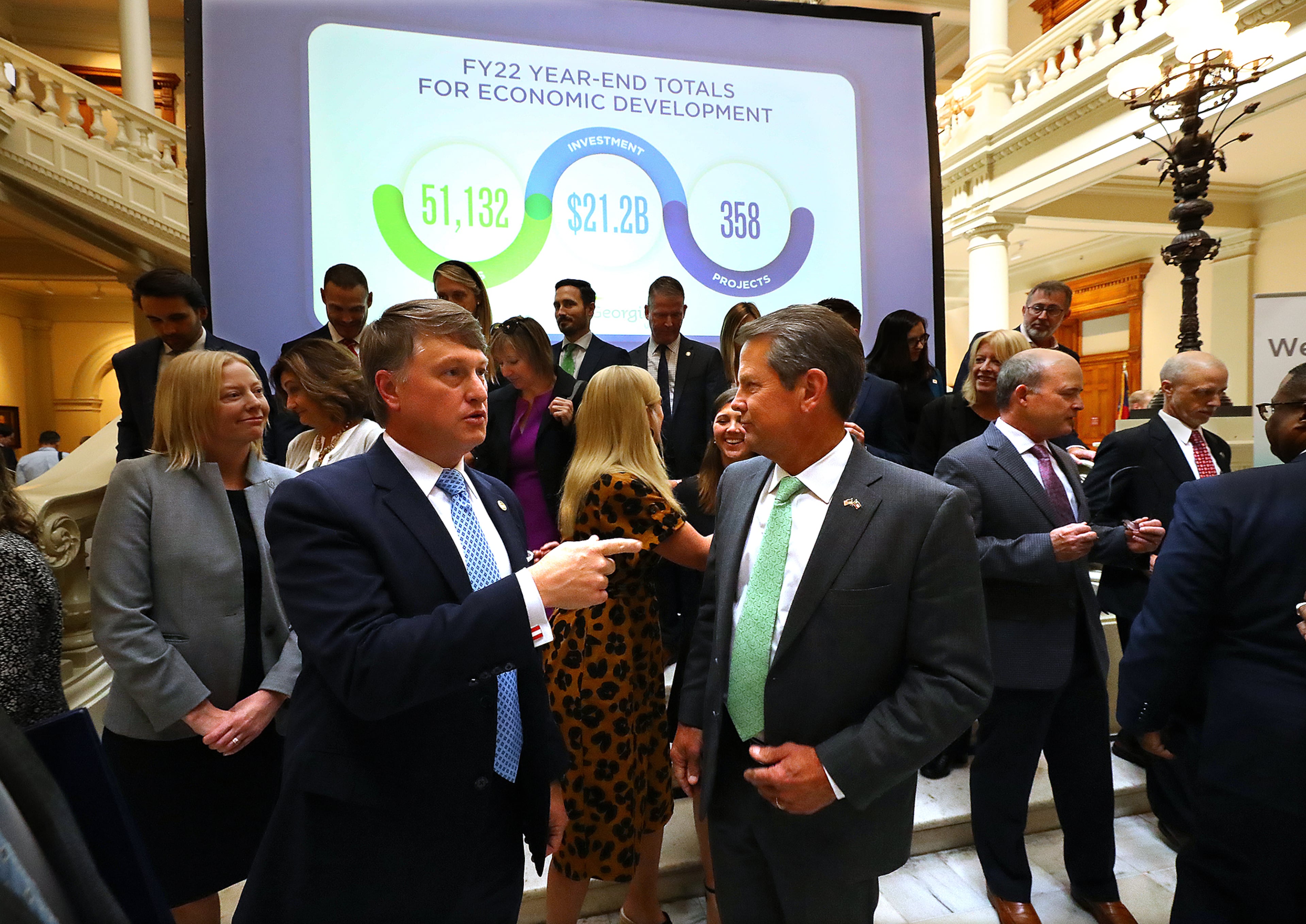 Commissioner of the Department of Economic Development Pat Wilson (left center), pictured with Gov. Brian Kemp in 2022, said of the prevalance of business expansions in the state in 2025: “Whether a company is new to Georgia or already here, domestic or international, the question is no longer if they’ll expand in Georgia — but when.” (Curtis Compton/AJC 2022)