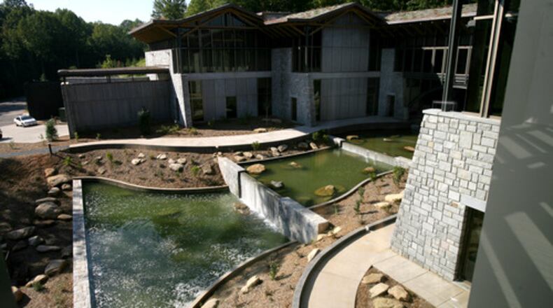 The Gwinnett Environmental and Heritage Center is shown with recycled water running through the middle.
