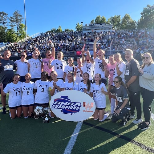 The West Forsyth team and coaches celebrate winning their fourth state title in six years, after beating Walton 2-1 in Thursday’s Class AAAAA girls’ championship game in Duluth.