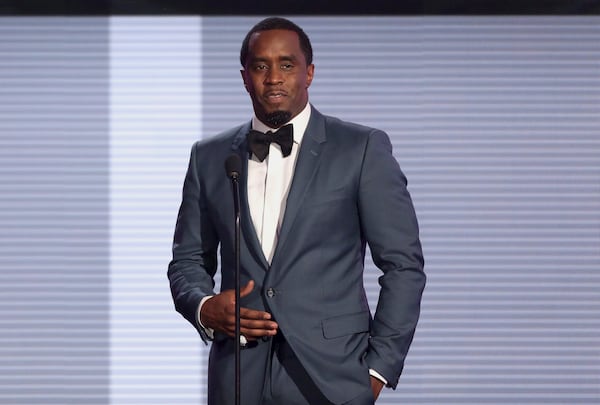 FILE - In this Nov. 22, 2015 file photo, Sean "Diddy" Combs presents the award for best collaboration of the year at the American Music Awards at the Microsoft Theater in Los Angeles. (Photo by Matt Sayles/Invision/AP, File)