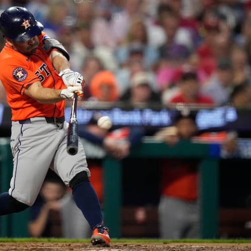 Houston Astros' Jose Altuve hits a double against Philadelphia Phillies pitcher Cristopher Sánchez for his 2,500th career hit during the third inning of a baseball game Wednesday, Sept. 9, 2026, in Philadelphia. (AP Photo/Matt Slocum)