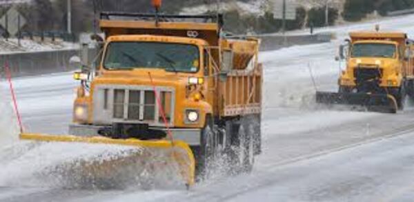  A snowplow at work during one of Atlanta's winter storms in 2014.