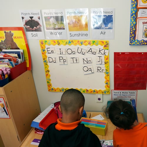 FILE - Students help put away supplies at the end of a reading and writing lesson at the Head Start program run by Easterseals, an organization that gets about a third of its funding from the federal government, Wednesday, Jan. 29, 2025, in Miami. (AP Photo/Rebecca Blackwell, File)