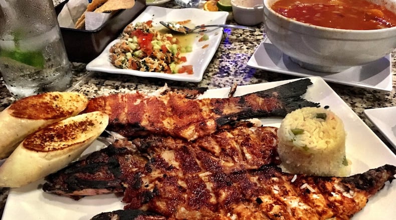 The snapper Zarandeado at Mariscos El Sazon del Kora is a classic dish of Narayit cuisine from Mexico. CONTRIBUTED BY WYATT WILLIAMS