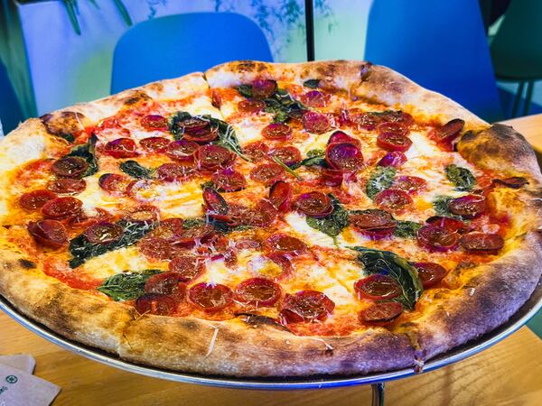 Brainwave Pizza's main attraction is the large, 18-inch New York-style pie with a sourdough crust. (Henri Hollis/AJC)