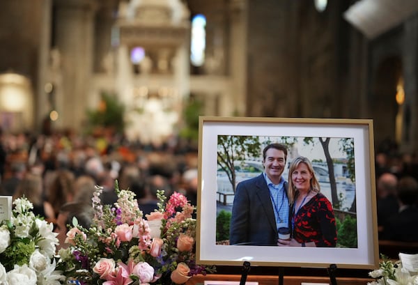 Pictures of Mark and Melissa Hortman are set up inside the sanctuary at the Basilica of St. Mary's during funeral services for Mark and Melissa Hortman in Minneapolis, Minn., on Saturday, June 28, 2025. (Alex Kormann/Star Tribune via AP, Pool)
