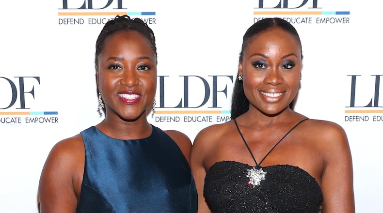 Midwin Charles, right, a legal analyst for MSNBC and CNN, has died at 47. (Bennett Raglin/TNS)