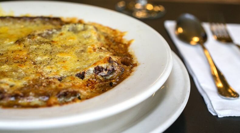Gratin lyonnais (Lyon-style caramelized onion soup made with chicken stock, sherry and thyme with crouton and gruyere cheese) as prepared by chef Jim Drohman at Le Pichet on Friday, Feb. 3, 2017, in Seattle. (Johnny Andrews/Seattle Times/TNS)