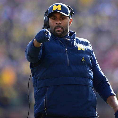 FILE - Michigan acting head coach Sherrone Moore reacts to a video replay during the first half of an NCAA college football game against Ohio State, Saturday, Nov. 25, 2023, in Ann Arbor, Mich. (AP Photo/David Dermer, File)