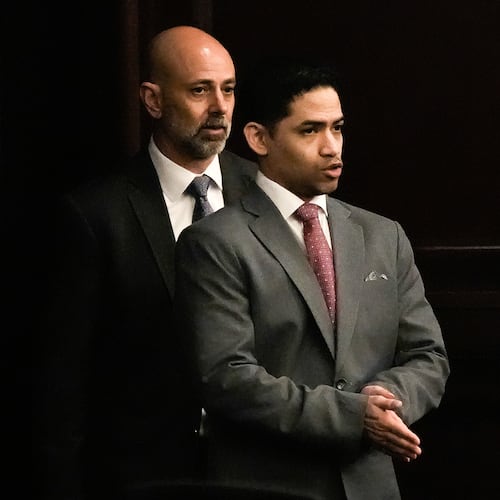 Defense Attorney James Hill, left walks in his client, defendant Mario Fernandez Saldana, during his trial on Tuesday, Aug. 25, 2026 at the Duval Count Courthouse in Jacksonville, Fla. [Doug Engle/The Florida Times-Union via AP, Pool)