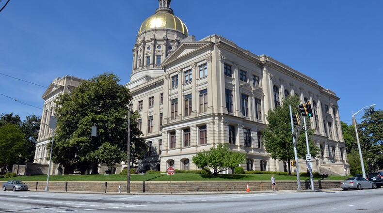 State, county and city governments will be closing early on Monday. KENT D. JOHNSON/KDJOHNSON@AJC.COM