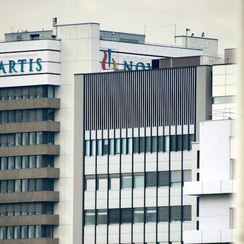 FILE - This Oct. 25, 2011 file photo shows the logo of Swiss pharmaceutical company Novartis AG on one of their buildings in Basel, Switzerland. (Georgios Kefalas/Keystone via AP, File)