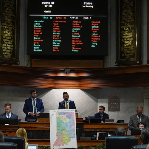Indiana Lt. Gov. Micah Beckwith announces the results of a vote to redistrict the state's congressional map, Thursday, Dec. 11, 2025, at the Statehouse in Indianapolis. (AP Photo/Michael Conroy)