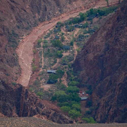 Buildings are seen in a flood damaged Bright Angel Canyon the Grand Canyon, Monday, Aug. 31, 2026, in Grand Canyon National Park, Ariz. (AP Photo/John Locher)