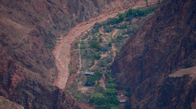 Buildings are seen in a flood damaged Bright Angel Canyon the Grand Canyon, Monday, Aug. 31, 2026, in Grand Canyon National Park, Ariz. (AP Photo/John Locher)