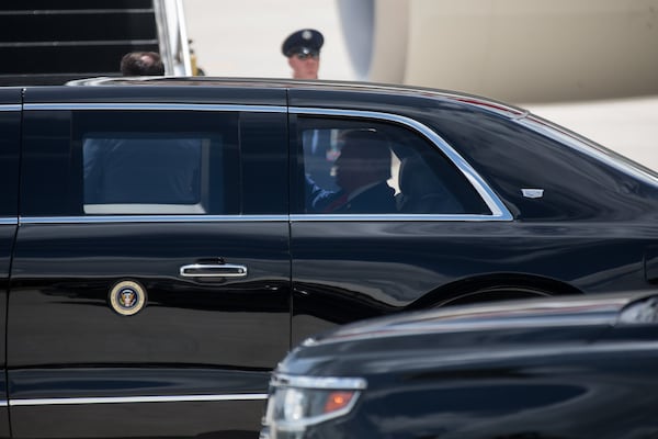 President Donald Trump arrives at Dobbins Air Reserve Base in Marietta on Wednesday. (Riley Bunch/AJC)