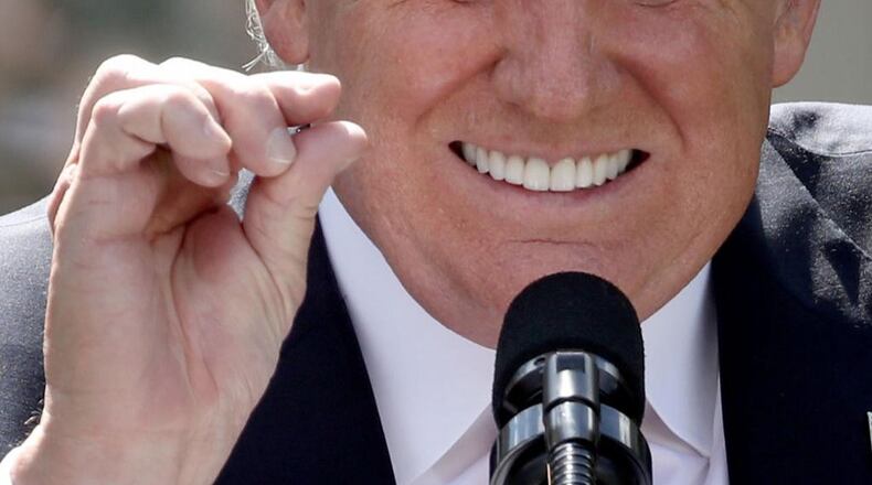 President Donald Trump announces his decision to pull the U.S. out of the Paris climate agreement in the Rose Garden at the White House June 1, 2017 in Washington. Trump pledged on the campaign trail to withdraw from the accord, which former President Barack Obama and the leaders of 194 other countries signed in 2015. The agreement was aimed at reducing greenhouse gas emissions in an effort at limiting global warming to a manageable level.