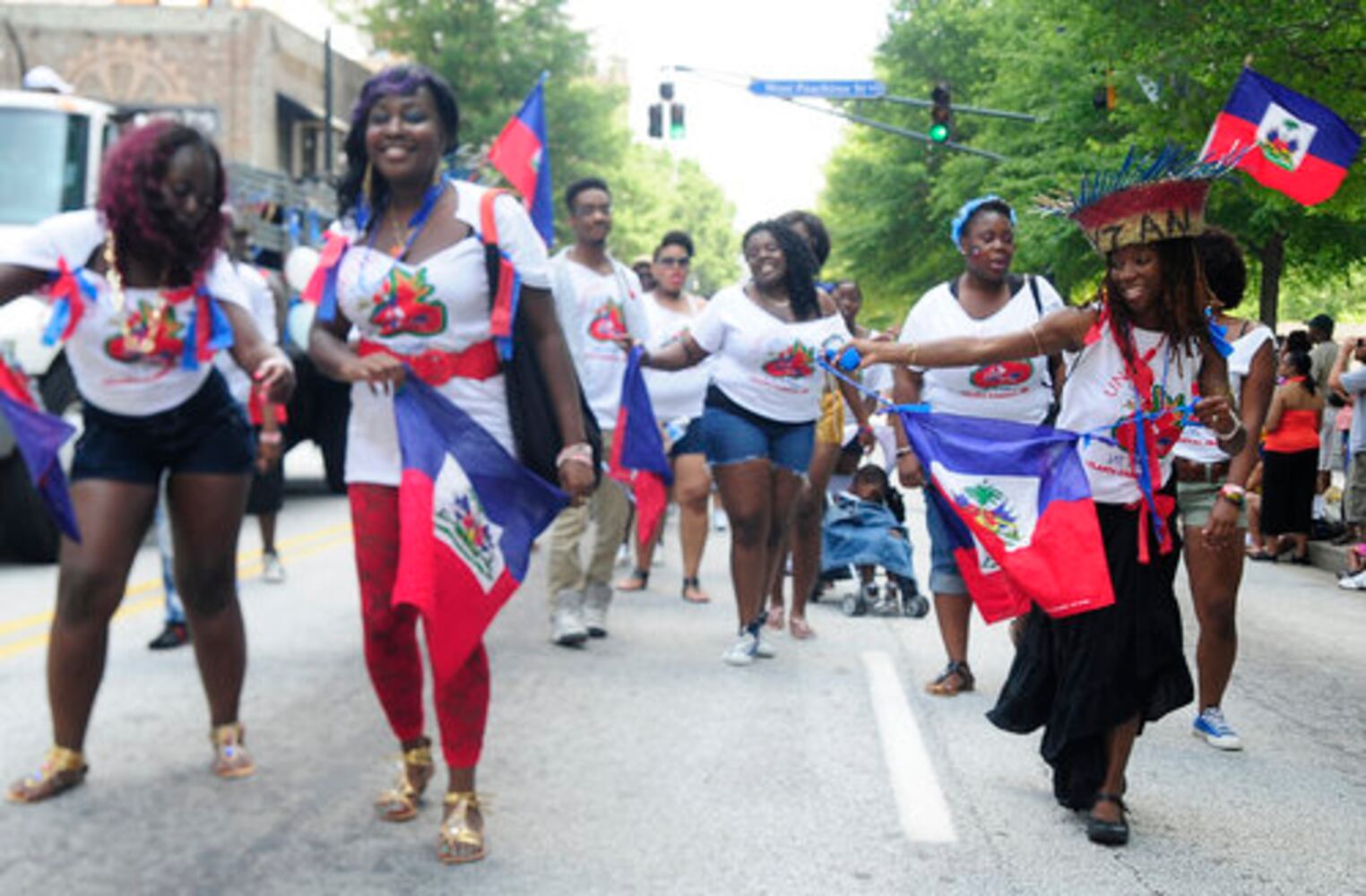 Colorful Caribbean Festival parade dazzles the day