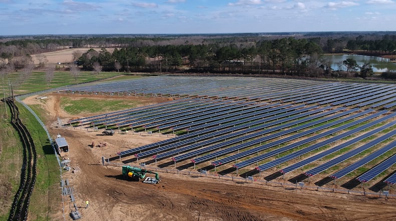 An aerial view of a solar panel array under construction in Terrell County, Ga., taken in February. HYOSUB SHIN / HSHIN@AJC.COM