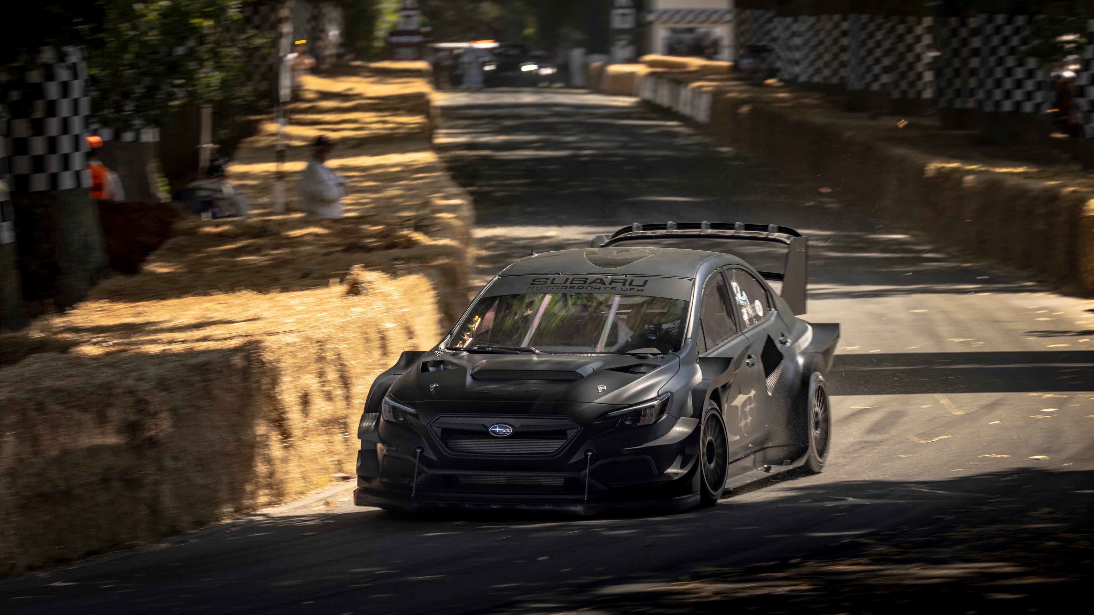Subaru's Project Midnight, a 2024 WRX, runs during the 2025 Goodwood Festival of Speed. The WRX, which stands for “World Rally Experimental,” has been the blueprint for successful rally racing across the globe. (Michael Shaffer/Subaru)