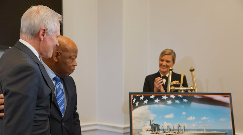 Navy Secretary Ray Mabus, U.S. Rep. John Lewis and a rendering of a new ship named for Lewis. (Courtesy: Office of John Lewis)