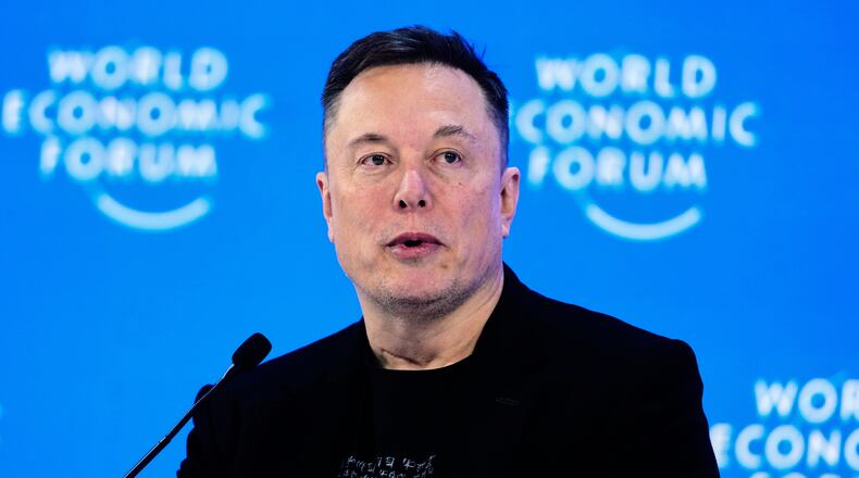 FILE - Elon Musk attends the annual meeting of the World Economic Forum in Davos, Switzerland, Jan. 22, 2026. (AP Photo/Markus Schreiber, File)