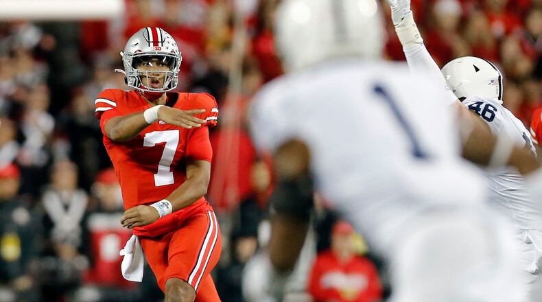 Ohio State quarterback C.J. Stroud (7) puts the ball in the air against Penn State during the second quarter at Ohio Stadium in Columbus, Ohio, on Saturday, Oct. 30, 2021. (Kyle Robertson/Columbus Dispatch/TNS)